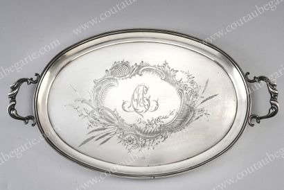 SILVER SERVICE PLATE. By IGNATIEFF, St. Petersburg, before 1896. Of oval form, engraved...