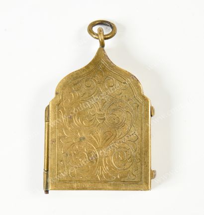 null GOLDEN BRONZE TRAVEL DIPTYCH.
In the form of a Russian church, decorated on...