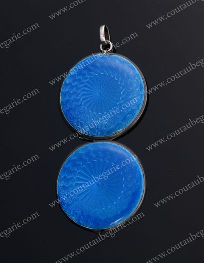 null SILVER PENDANT MEDAL.
Of round shape, with enamelled translucent blue decoration...
