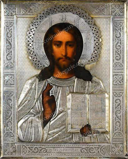  CHRIST PANTOCRATOR. Russian icon, tempera on wood, preserved under a silver riza...