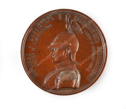 null MÉDAILLE COMMÉMORATIVE.
En bronze à patine brune, signée P. Brousnitsine (1816-1877),...