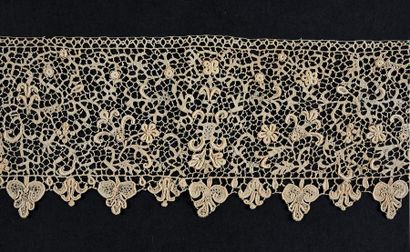 null Border in Point de France, needle, France, late 17th century.
Decorated with...