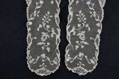 null Pair of beards, Argentan, needle, France, circa 1760-80. 
A branch of flowers...