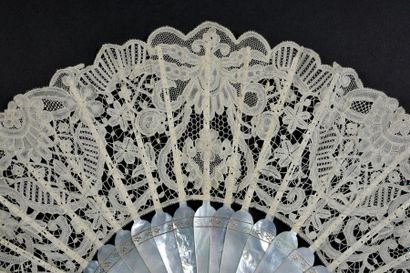 null Folded fan made of duchess lace, circa 1900.
Lace leaf with bobbin lace worked...