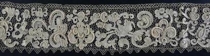 null Needle lace, late 19th century
A wide border with large relief motifs worked...