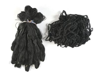 null Twenty-four skeins of silk threads, bobbin lace, early 20th century.
Seventeen...
