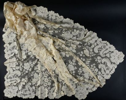 Stoles and lace mantilla, early 20th century....