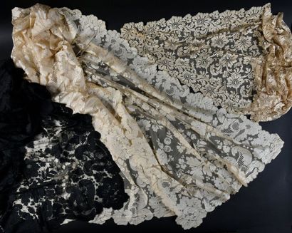 null Stoles and lace mantilla, early 20th century.
In mechanical lace with floral...