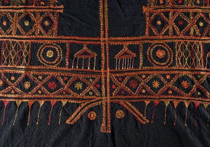 null WOOLLEN TUNIC.
Rectangular in shape, embroidered with orange and yellow geometric...