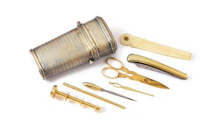 null TRAVEL SEWING KIT.
Preserved in a giltwood box, containing a pair of scissors,...