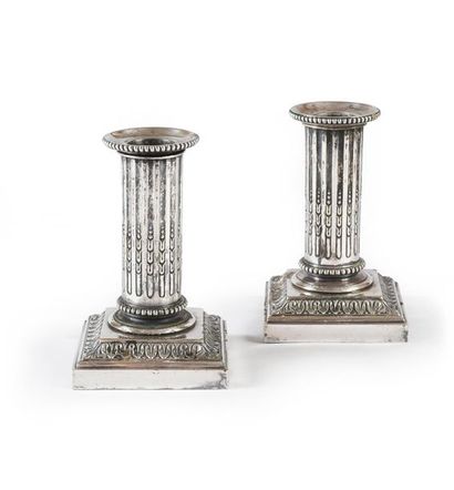 null PAIR OF SMALL CANDLE HOLDERS.
In gilded metal, Louis XVI style, fluted cylindrical...