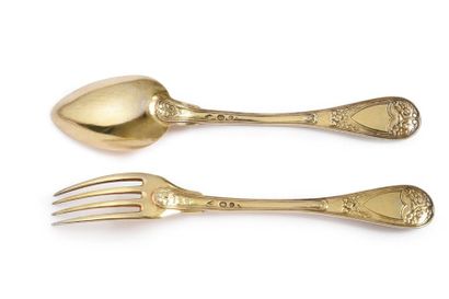 null SET OF GILT CUTLERY.
Composed of a fork and a spoon, decorated with a horn of...