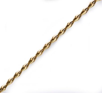 CARTIER Necklace and bracelet in 750° gold mesh, clasp with carabiner. Signed and...