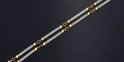 FRED "Force 10"
750° gold and twisted steel cable set consisting of necklace and...