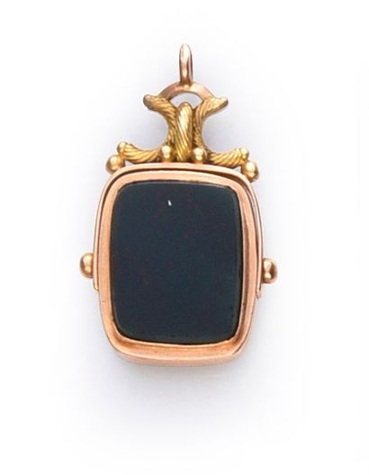 null Slider for a gold watch chain adorned with a rotating cameo on mother-of-pearl...