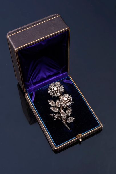 null Trembling brooch in 750° gold and 925e silver, featuring a branch of roses,...