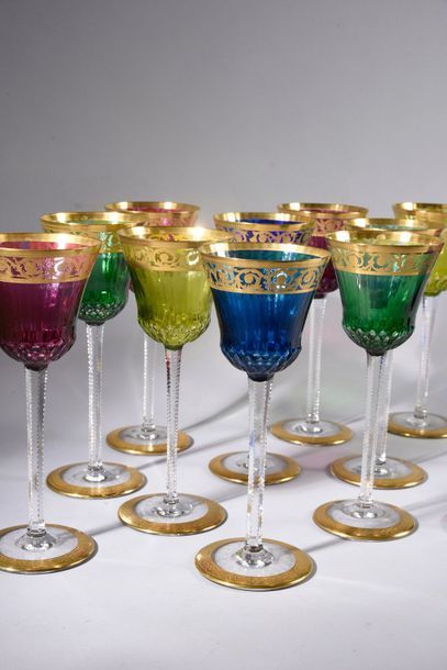 Saint Louis, modèle Thistle Twelve wine glasses in cut crystal and colored gold.
Height:...