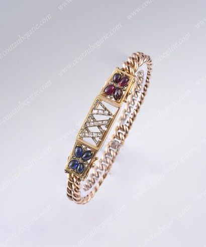 null * YELLOW GOLD BRACELET. 
 Decorated with a removable rectangular medallion set...