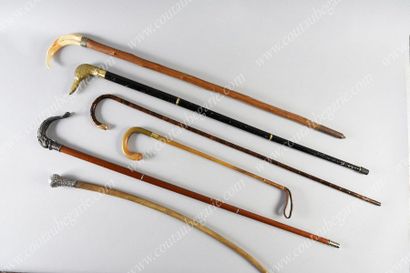 null *CANE WITH POMMEL. 
 Wooden shaft, decorated with a gold tip. Small accidents.
English...