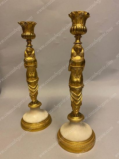 null *CARIBBON WOOD PEAR.
With caryatid decoration draped in gilt bronze resting...