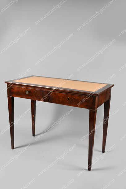 null WRITING TABLE IN Mahogany.
Rectangular in shape, mahogany on all sides, opening...