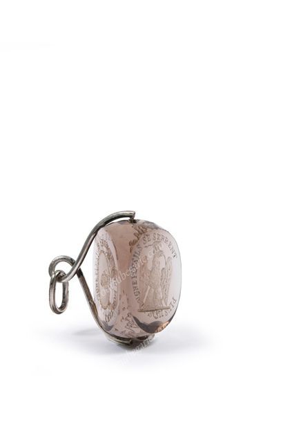null IMPORTANT PENDENT HIDING SEAL
Carved in a block of smoky quartz. Three-sided...
