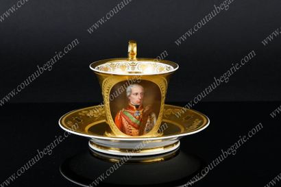 null CUP AND SAUCER MADE OF VIENNA PORCELAIN. 
 Decorated with a polychrome portrait...
