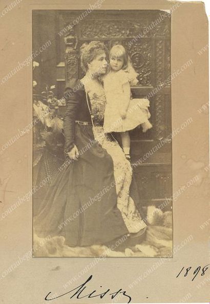 MARIE, reine de Roumanie (1875-1938) 
Photographic portrait showing her sitting in...