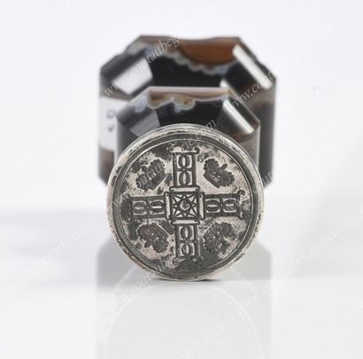 null HIDDEN SEAL.
Round silver matrix, chiselled with the initials B.B. interlaced...