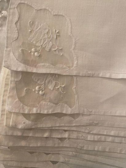 null Linen and organza embroidered dinner service, tablecloth and twelve napkins,...