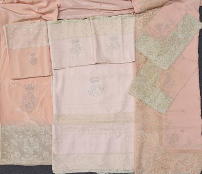 null Embroidered bed linen set, circa 1938, top and bottom sheets and a pair of salmon...