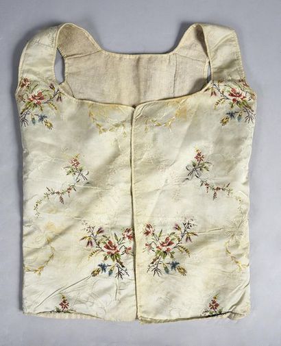 null Camisole with basques, end of the 18th century, lampas fashioned in polychrome...