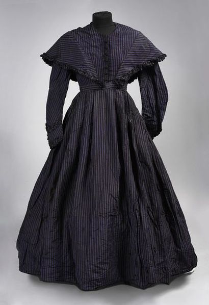 null Afternoon dress, circa 1850, dress in black and purple striped taffeta, the...