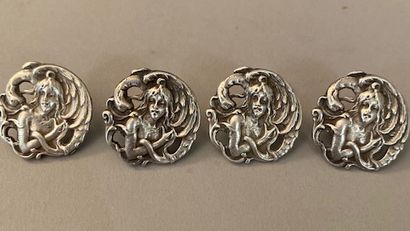 null Set of four buttons, circa 1900, cast silver openwork buttons featuring Leda...