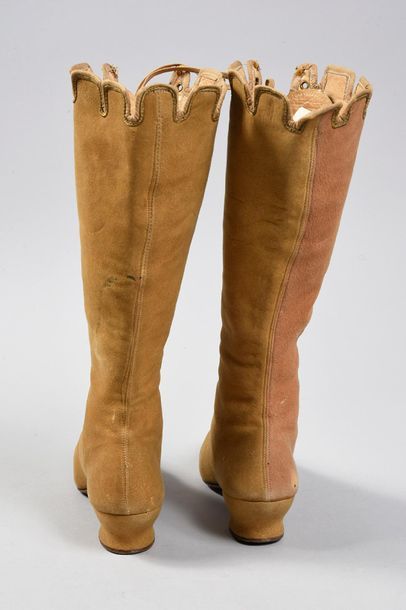 null Pair of lace-up boots, late 19th century, high 
boots with stitched pointed...