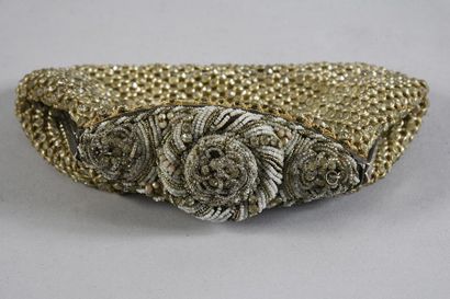 null Embroidered evening clutch, circa 1910, fishnet set with rhinestones on cream...