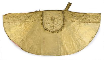 null Early 20th century, gold cloth cope; orphreys embroidered in gold guipure with...