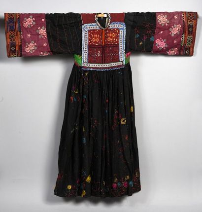null Ceremonial dress, Pakistan, black cotton canvas embroidered with silk chain...