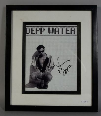 null DEPP Johnny (°1963).

B&W photographic reproduction of the actor bearing his...