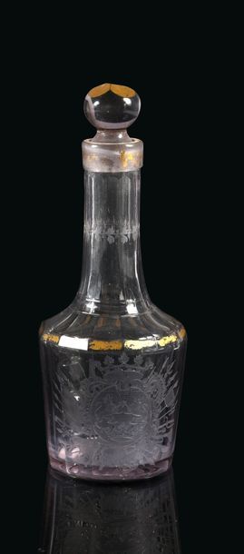 null CARAFE. 

In crystal with cut-faceted decoration, engraved on the front of a...