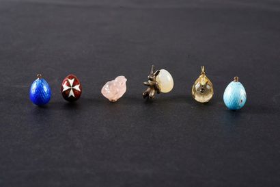 null SET OF SIX PENDING MINIATURE EGGS, one of
which is in silver with a white enamel...