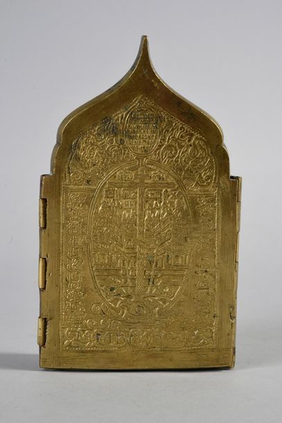 null QUADRIPTYCH TRAVEL ICON.
In gilded bronze, partially enamelled blue, decorated...