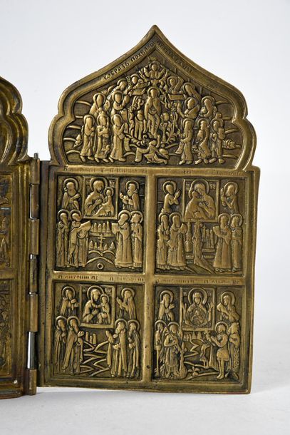 null ICÔNE QUADRIPTYQUE DE VOYAGE.
En bronze doré, ornée de 12 scènes du Nouveau...