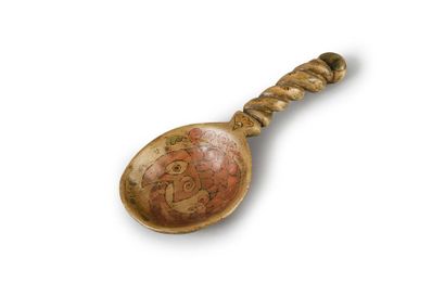 null LARGE SERVING SPOON.
In polychrome wood, the handle turned and engraved with...
