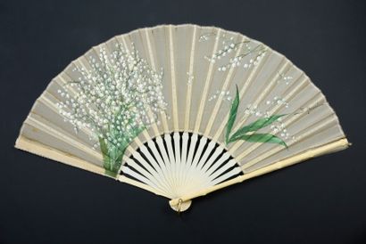 Lucky charm, circa 1900 Folded fan, the cream...