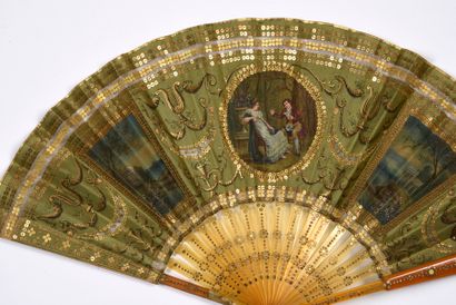 null Reading in the garden, circa 1910-1920
Small folded fan, the green silk leaf...