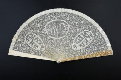  With the number "R", China, circa 1800 Broken ivory fan* very finely pierced with...