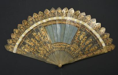 null Two fans, circa 1820
One, of the broken ivory type, painted with a gilt decoration....