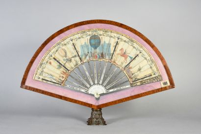 null The first flight of the hot-air balloon, circa 1783-1785
Rare folded fan, the...