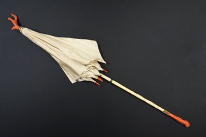 Coral umbrella, circa 1880 Cream silk flag....